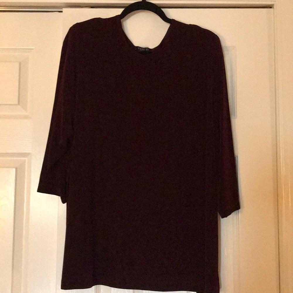 Vikki Vi three quarter sleeve knit top.